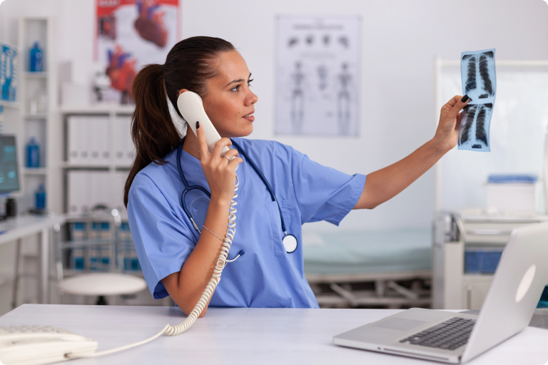 medical-nurse-holding-patient-radiography-hospital-office-while-talking-with-doctor-phone-heal